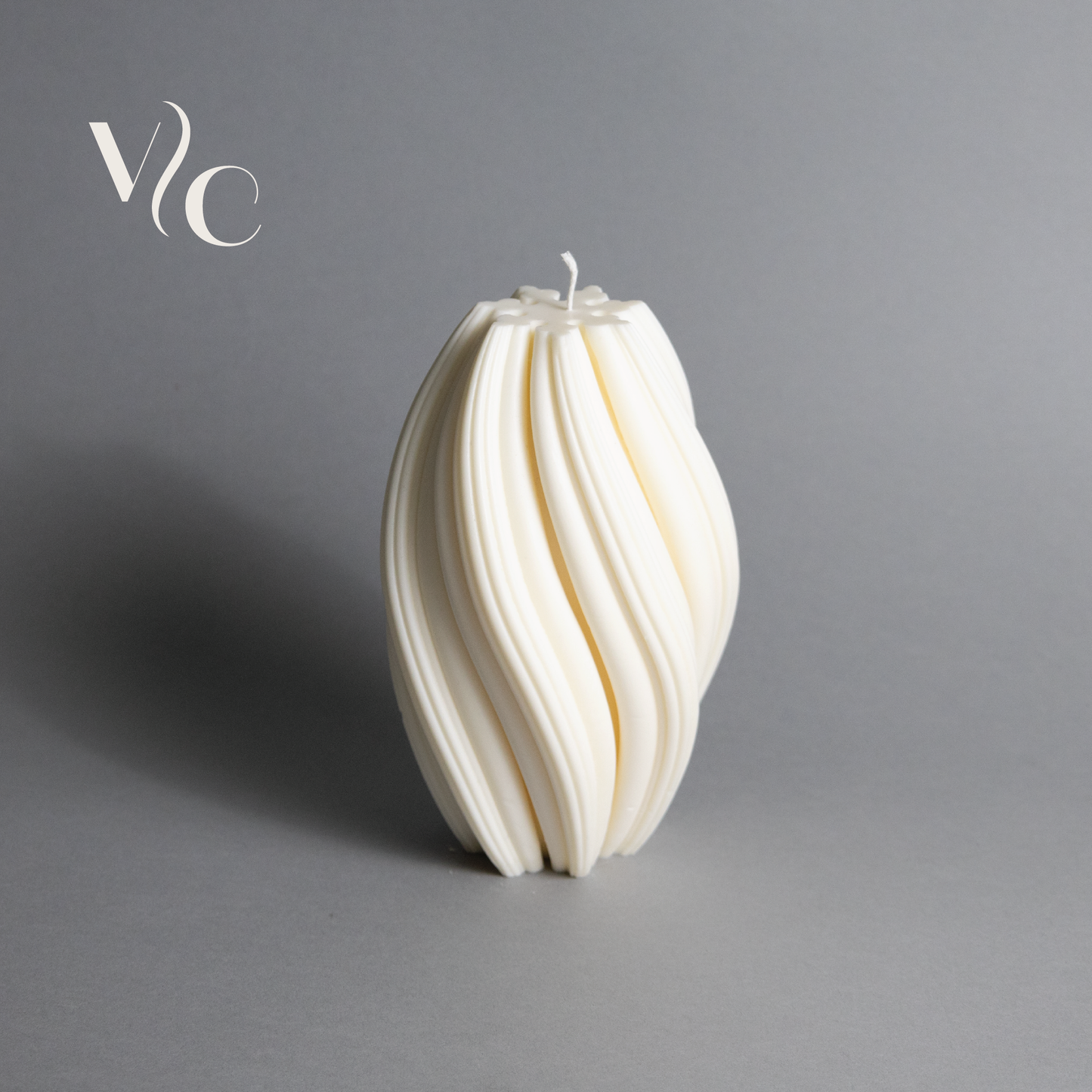 Large Wave Twirl candle included in the Wave Candle Duo