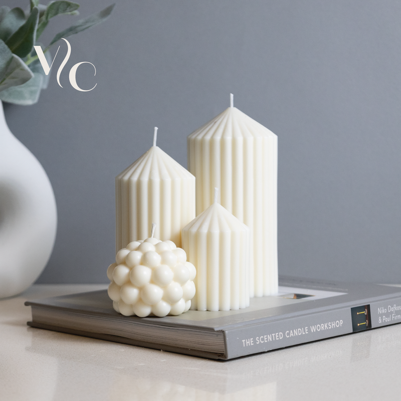 Elegant handmade sculptural candles in artistic shapes