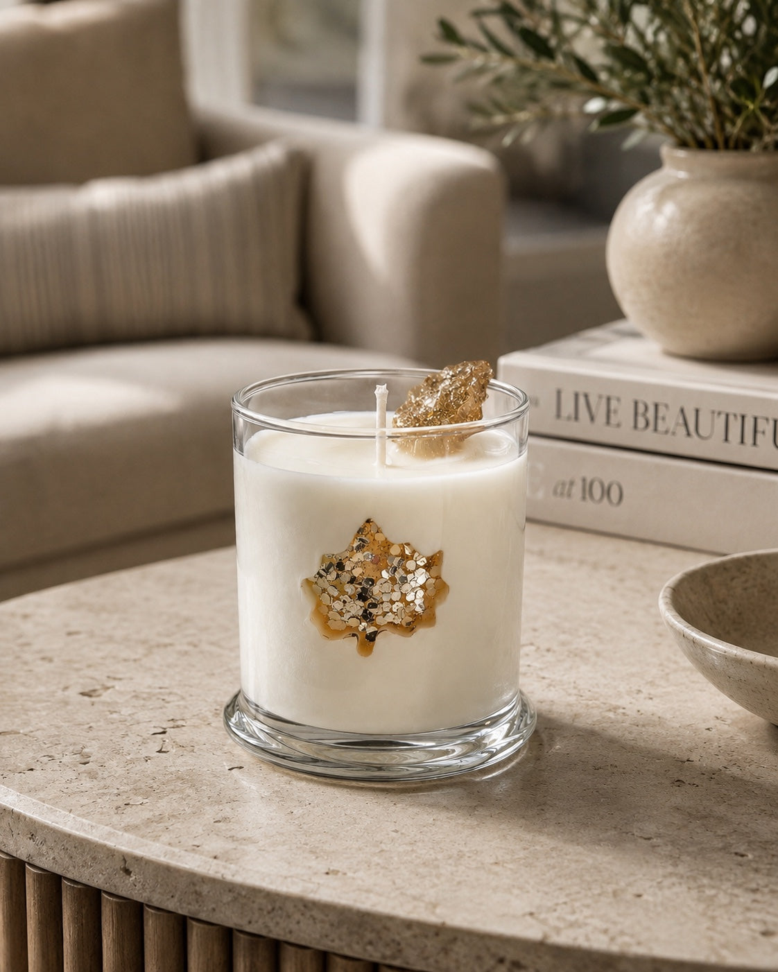 Golden Autumn Maple Leaf candle styled in a warm neutral interior