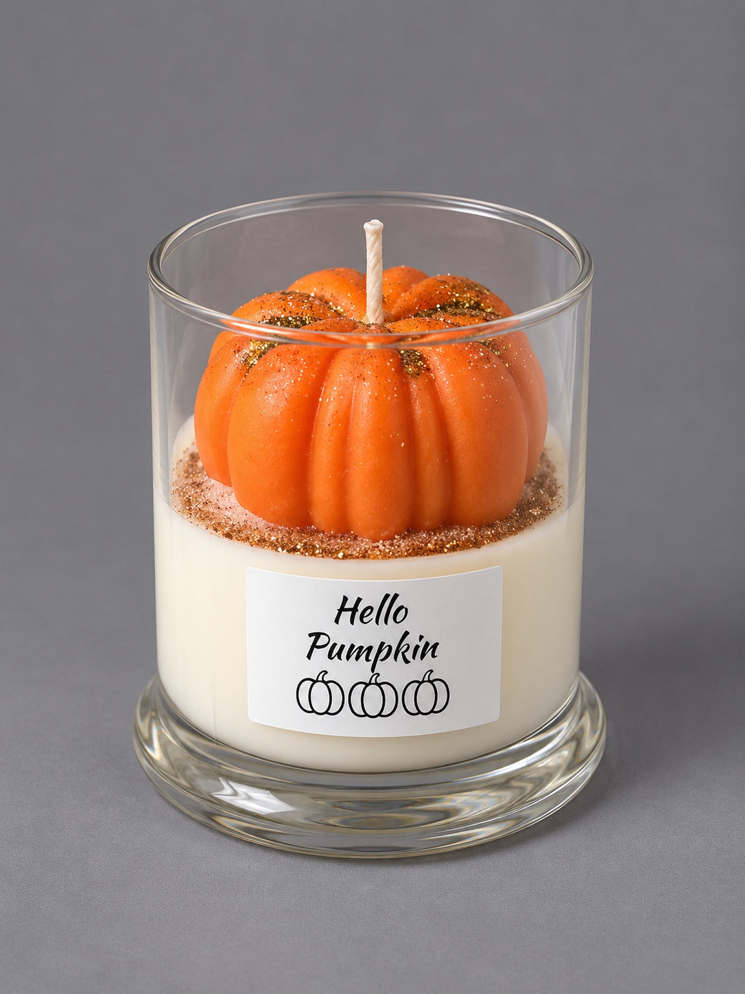 Hello Pumpkin candle with orange pumpkin wax decoration