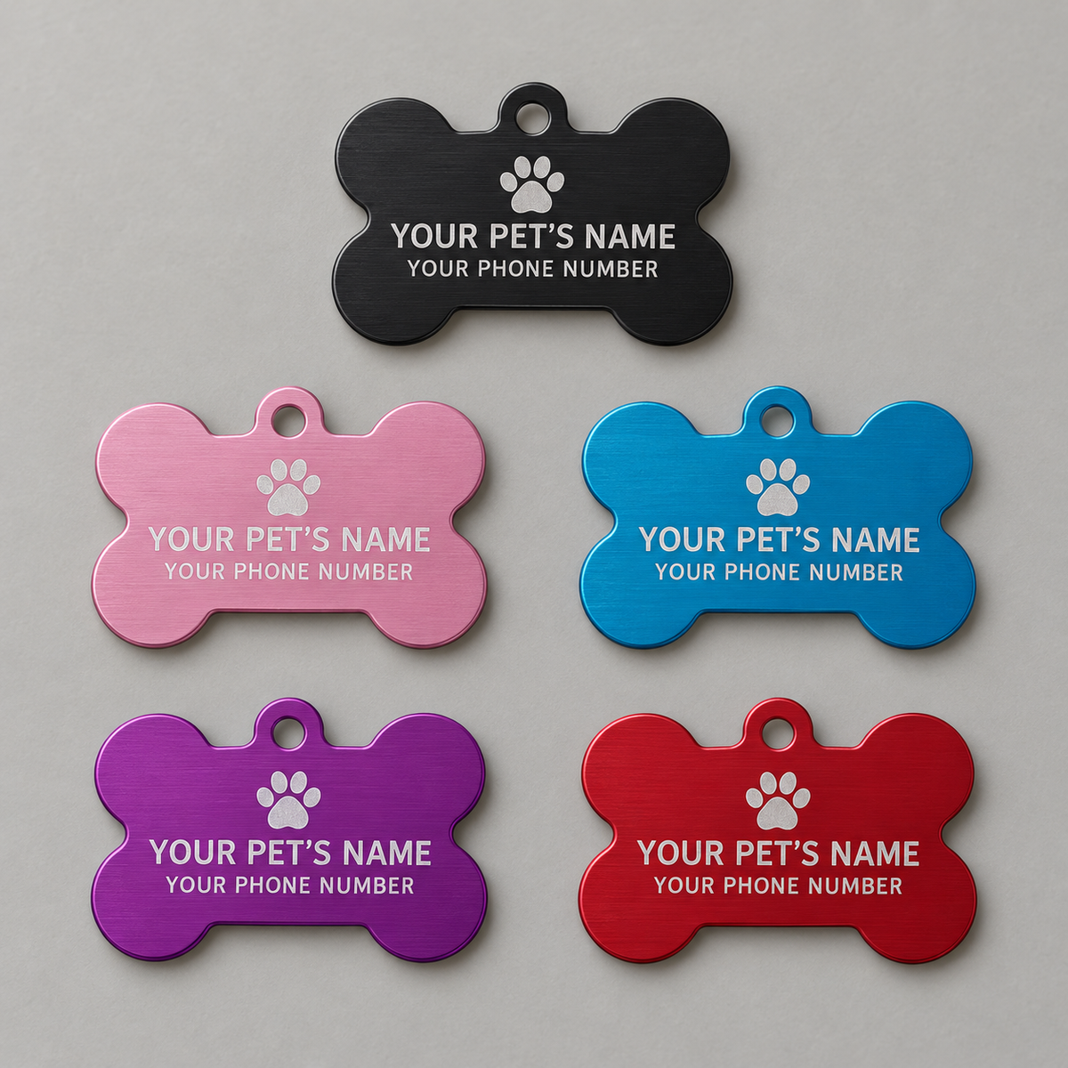 Personalization preview: bone-shaped pet ID tags in five colors with custom pet name and phone number