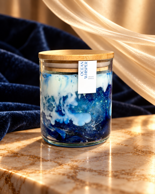 Ocean Whisper candle with blue and white marbled wax in a clear jar with a bamboo lid