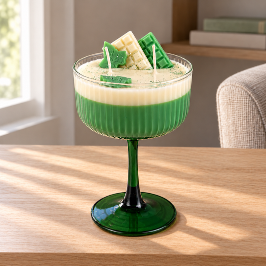 Matcha Cocktail Candle, 8 oz on a straight pale oak table in natural daylight