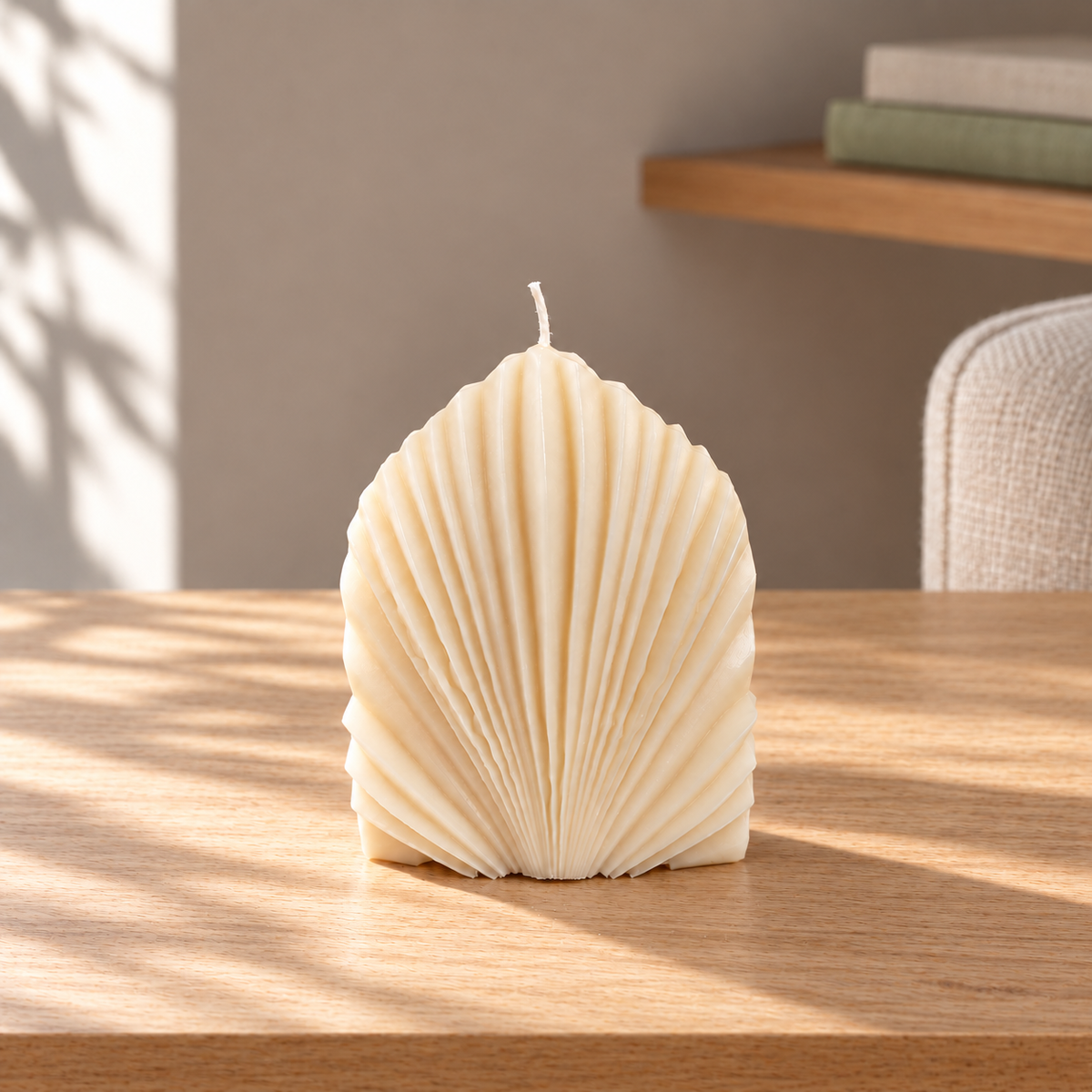 Shell Harmony Soy Wax Candle on a straight pale oak table in natural daylight