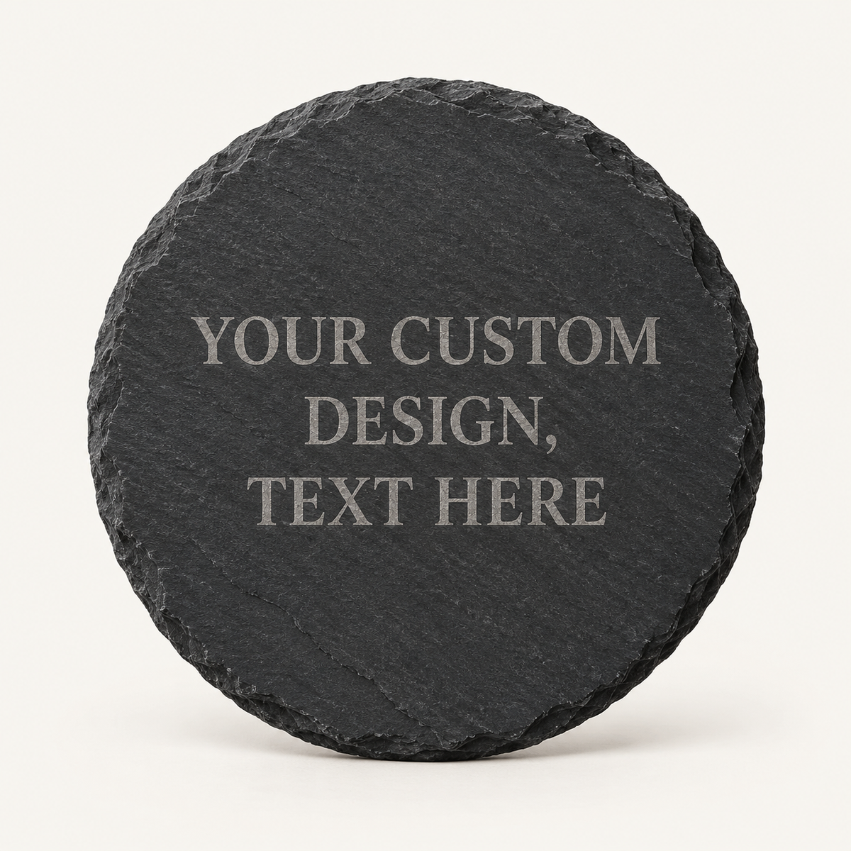 Illustrative personalized round slate coaster on a barely beige background